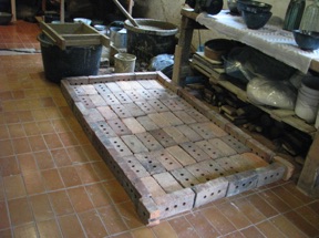 Bed to dry wet clay